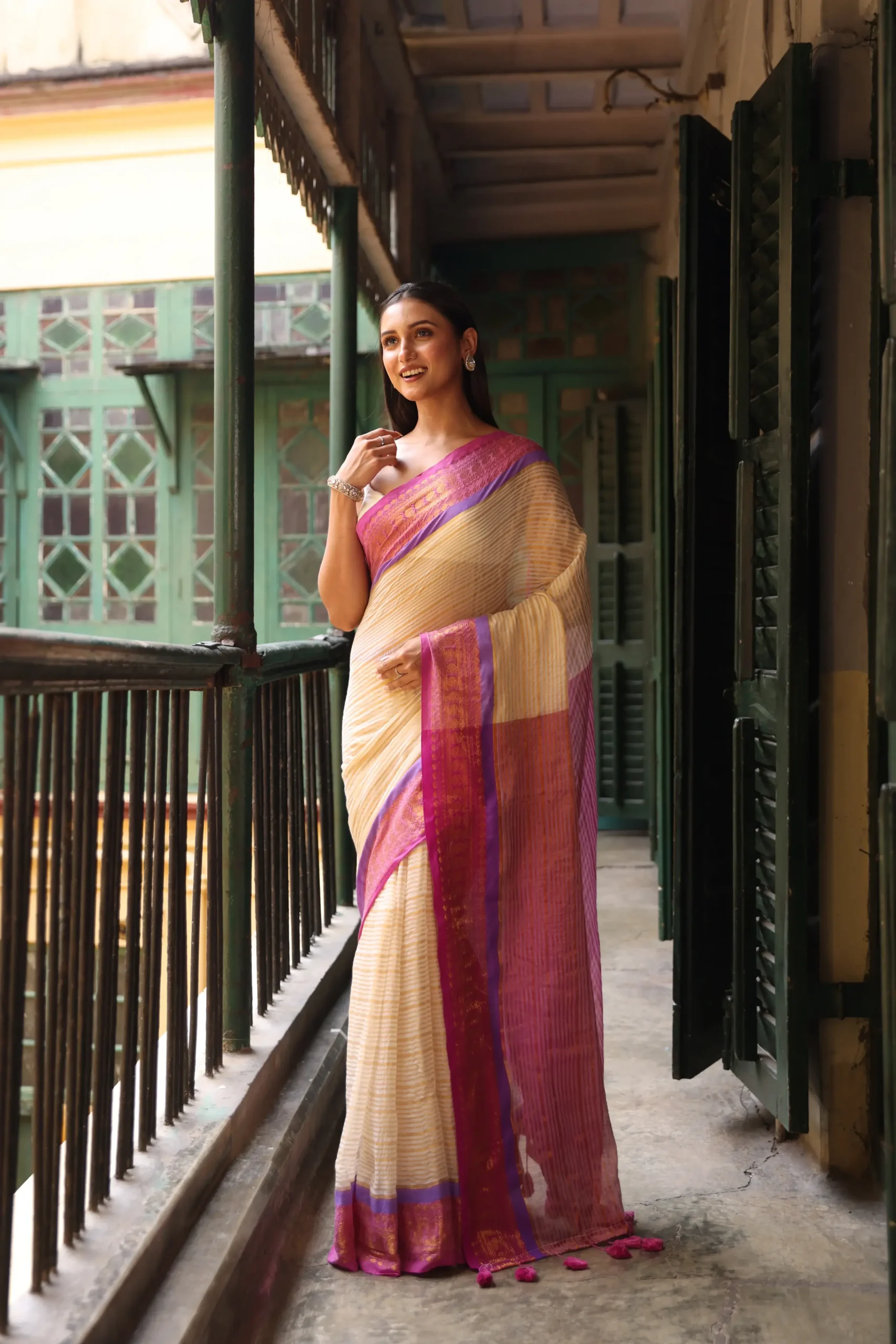 Beige Mul Saree With Gold Stripes And Purple Border