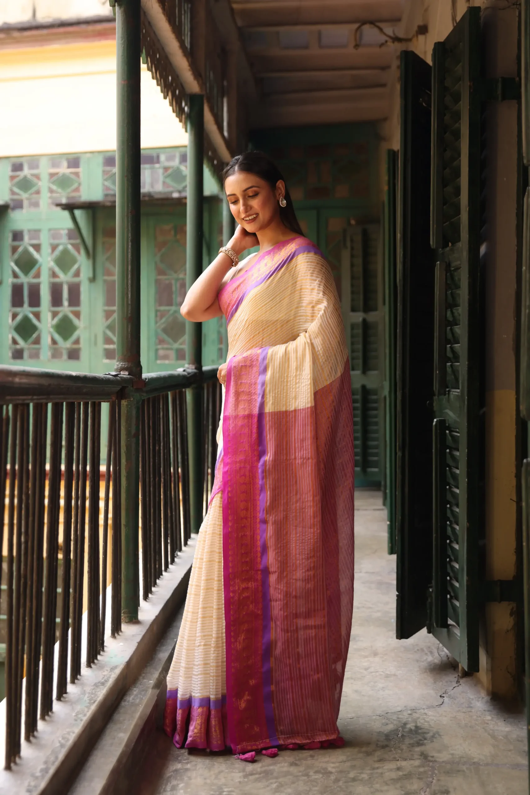 Beige Mul Saree With Gold Stripes And Purple Border